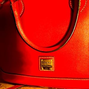 Dooney and Bourke zip zip leather satchel with crossbody adj strap.